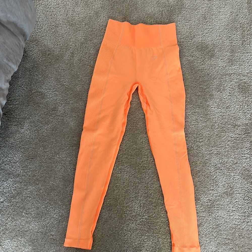 Color: Vibrant Orange Size: Medium Brand: gymshark dry leggins
